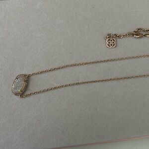 Rose gold Kendra scott necklace